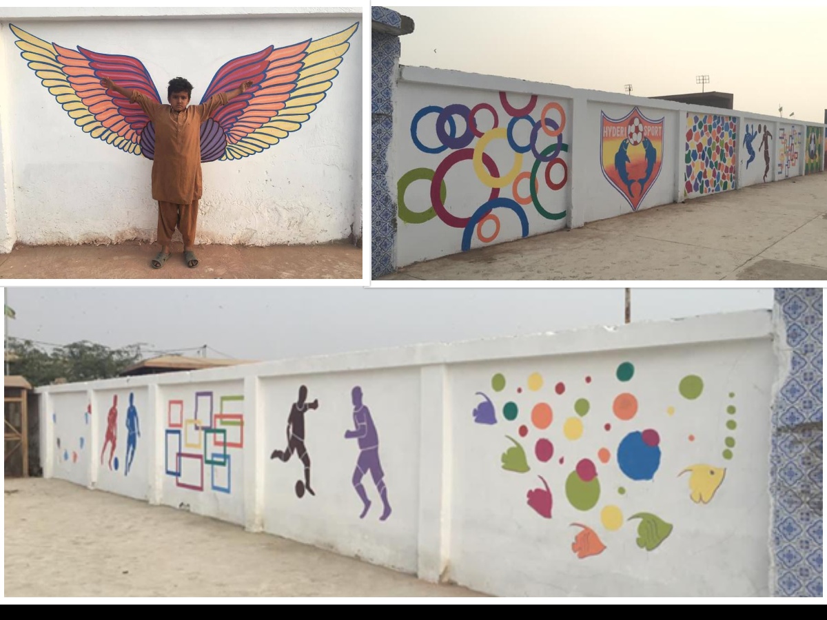 Empty walls cleaned up and painted to give a pleasant look of the area, at Korangi